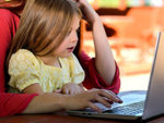 little girl and laptop